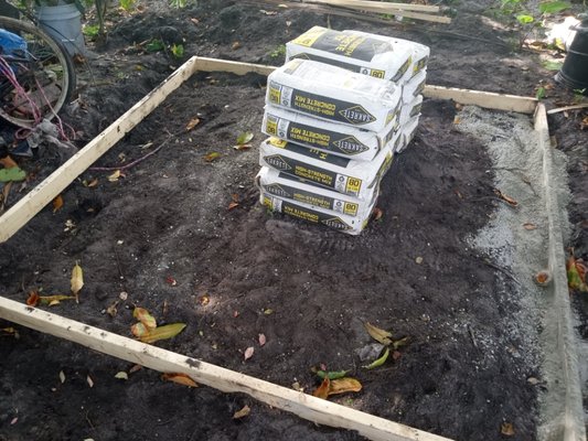 Real photo of a concrete slab foundation being prepped for pour by Morgan Carpet and Construction